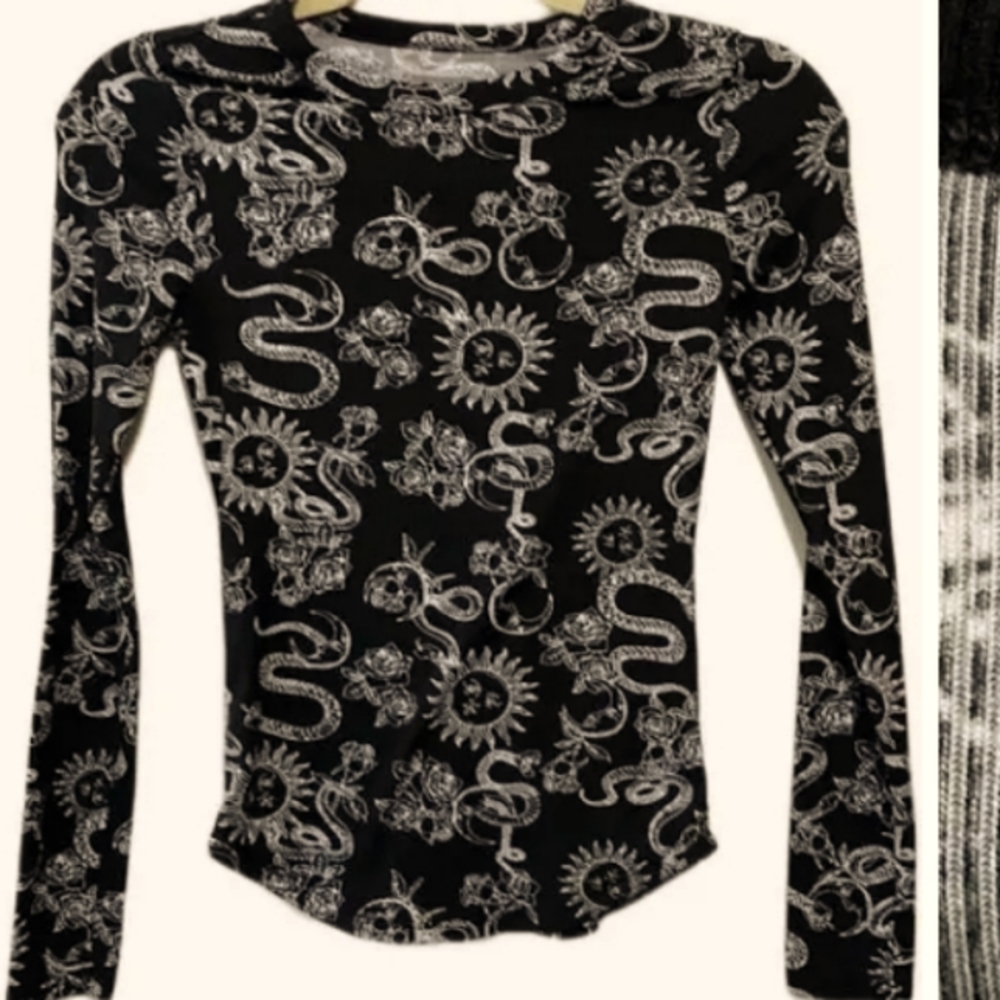 Women's long sleeve, NWOT blk/wht Sweater. I wore it once.